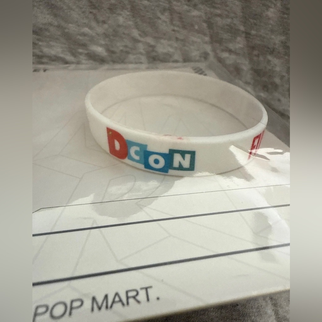 White Dcon Silicone Bracelet